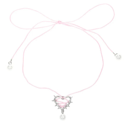 Thorn Heart Bow Neckpiece