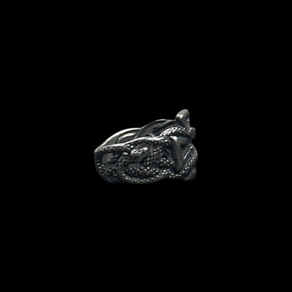 Cross snake ring